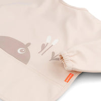 Babero grande con mangas y bolsillo Ozzo 6-18M Rosa